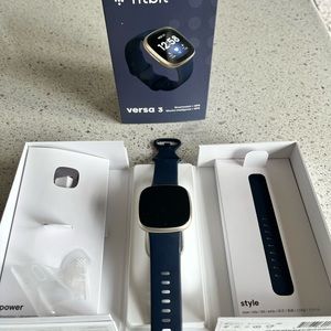 Fitbit Versa 3 Smart Watch + GPS gold aluminum case & midnight infinity band.